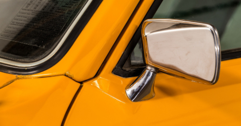 Orange Automobile Drivers Side with Side Mirror