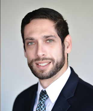 Kyle E.  Friesen